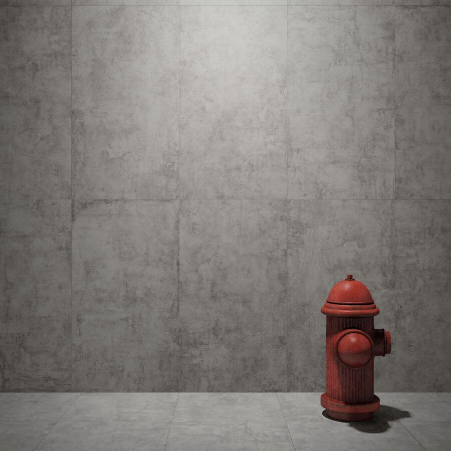 BEAT-GREY-CEMENT-LOOK-PORCELAIN-TILE. Image shows large grey tiles with red water spout