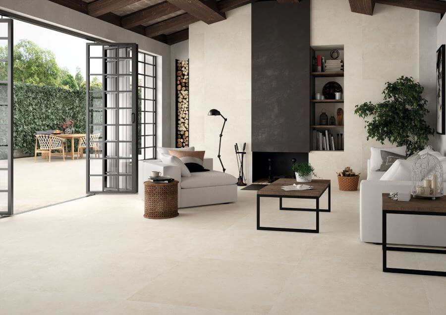 Metro Bone cement look porcelain tile. Image shows cream tiles in lounge and patio.