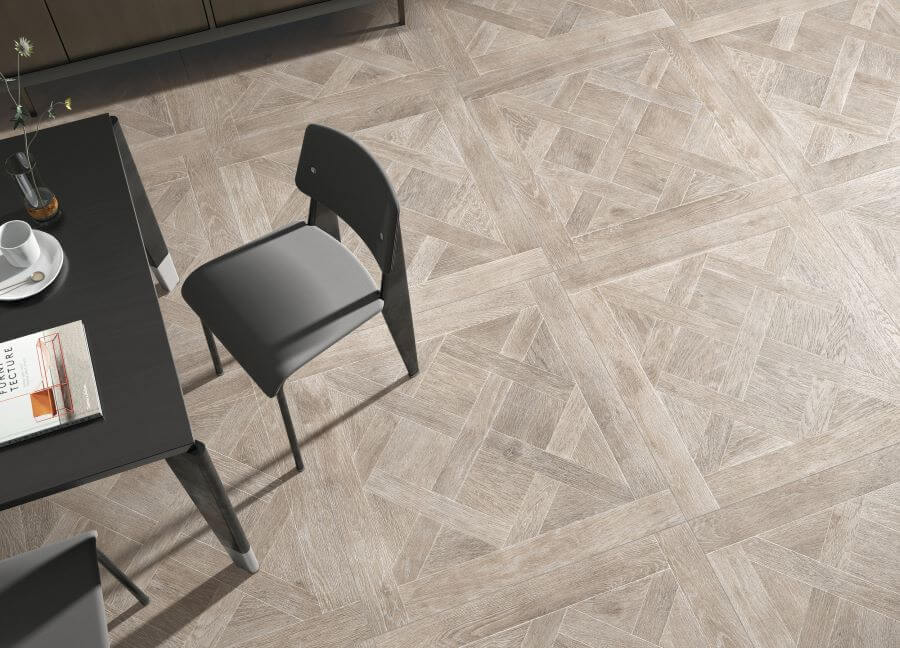 Louis Mocha. Image shows mocha porcelain floor tile that looks like wood in office