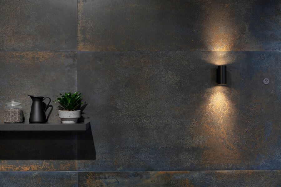 METALLIC-PORCELAIN-BATHROOM-TILES-PATINA-BLUE-RUST. Image shows metallic porcelain bathroom tiles on wall