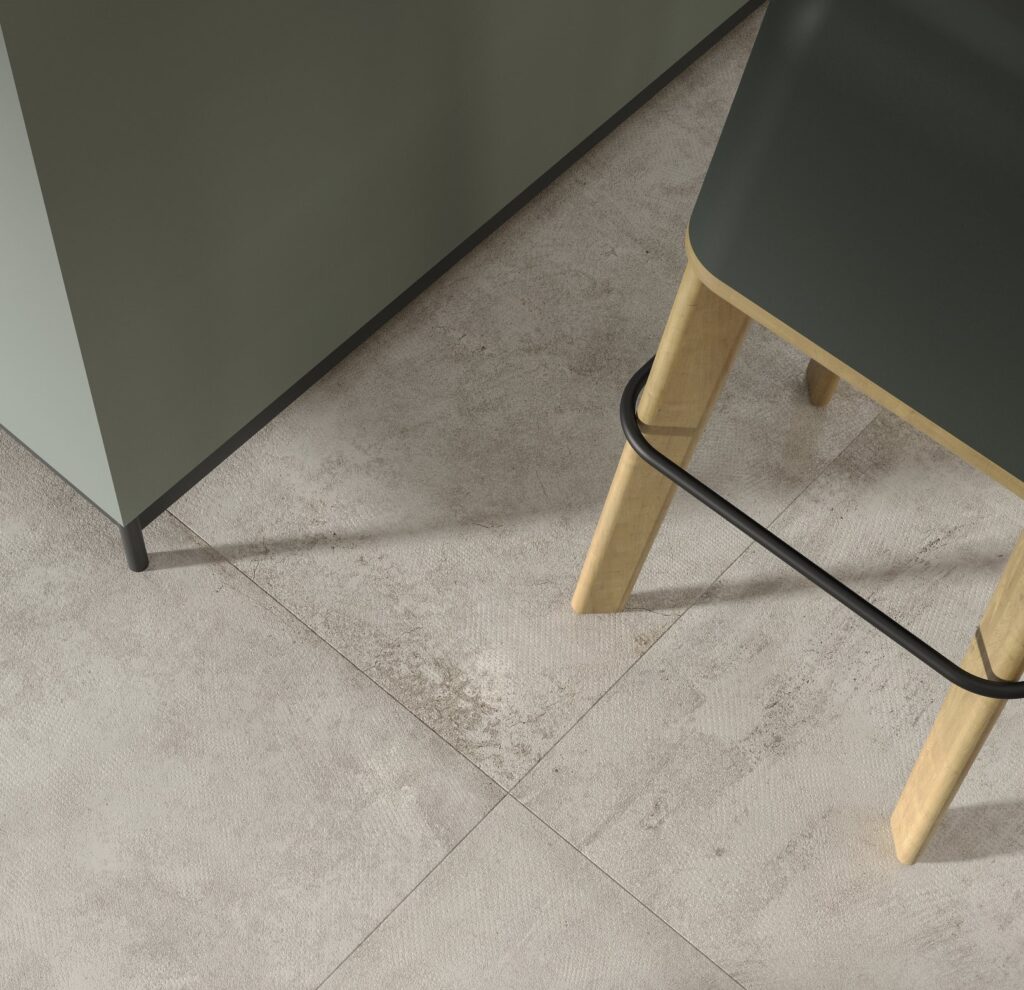 Image shows concrete porcelain tiles close up in kitchen