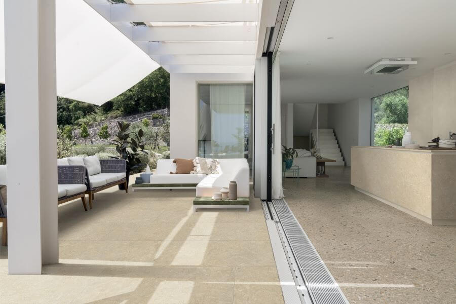 Fusion arena limestone porcelain tiles with warm stone terrazzo 1