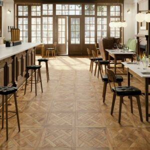 TANGLE-RUSTIC-WOOD-CERAMIC-TILE. Image shows rustic wood ceramic tile in restaurant with a bar and tables and chairs