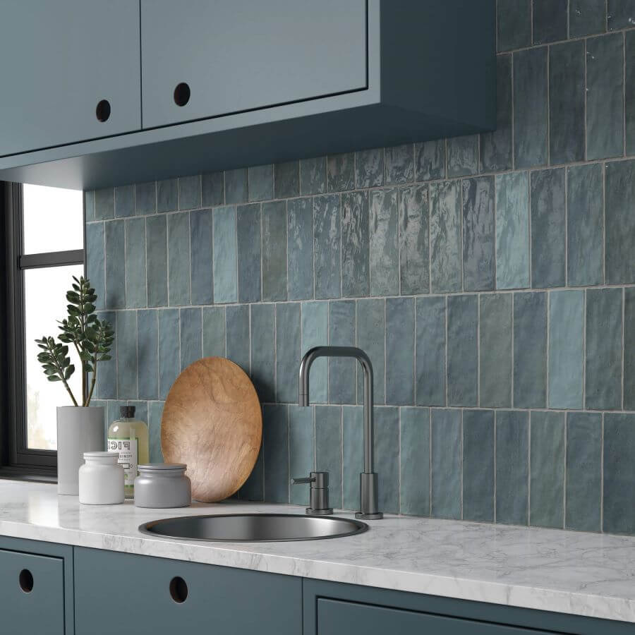 ADORE-AQUA-CERAMIC-SPANISH-TILE. Image shows blue ceramic Spanish tile in kitchen as splashback with sink and worksurface