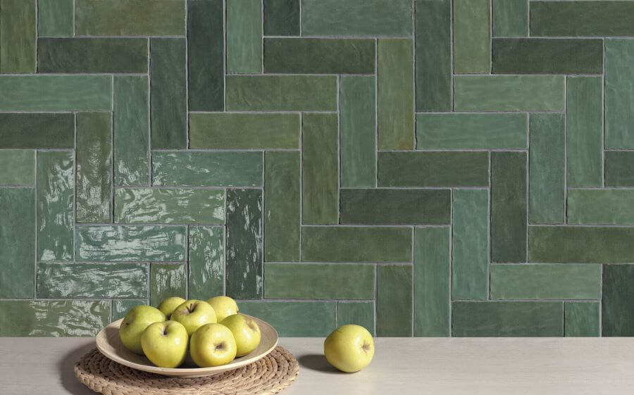 ADORE-BOTTLE-GREEN-CERAMIC-SPANISH-TILE. Image shows green ceramic Spanish tile in kitchen with apples