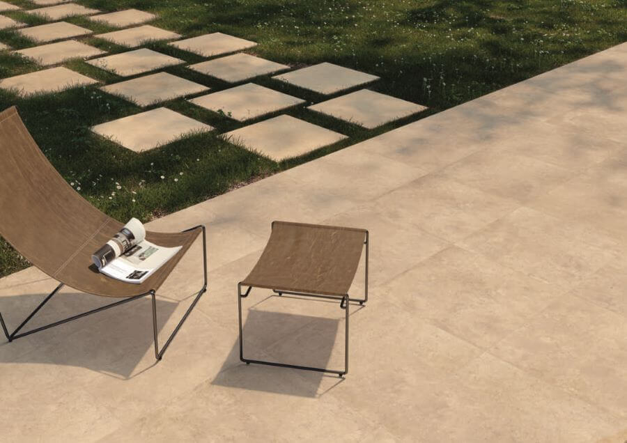 ARTISAN-ROPE-CONCRETE-LOOKING-TILES-OUTSIDE. Image shows cream concrete looking tiles outside