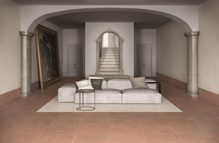 BLEND-NUTMEG-CEMENT-LOOK-PORCELAIN-TILE. Image shows red look cement porcelain tile in lounge area