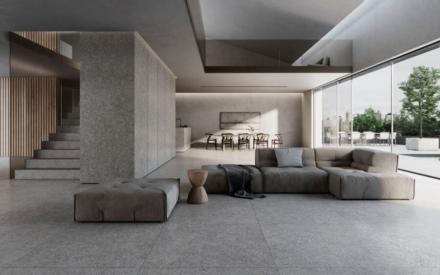 Define Grey. Image shows grey terrazzo effect porcelain tile in lounge