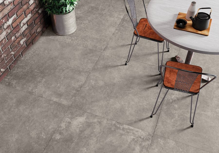 DOCKLANDS-GREY-CEMENT-PORCELAIN-TILE. Image shows grey cement porcelain tile on patio