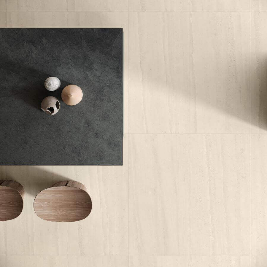 ETHOS-SAND-STONE-LOOK-PORCELAIN-TILE-FLOOR. Image shows sand stone look porcelain tile to floor of kitchen with grey stone island