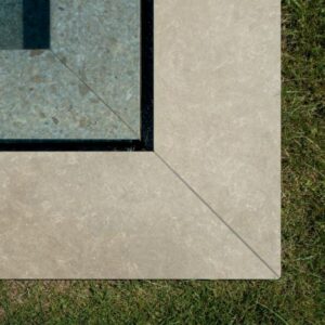 FUSION-LIMESTONE-PORCELAIN-TILES-2CM. Image shows limestone porcelain tiles around swimming pool