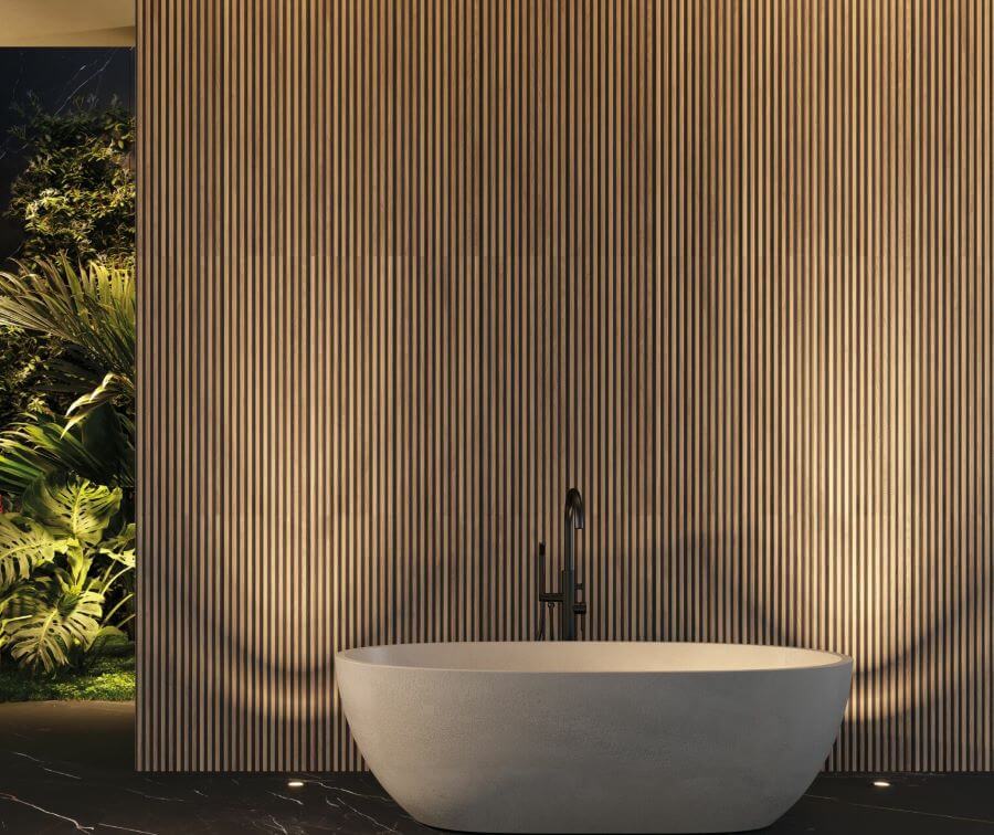 OAKWOOD-WOOD-LOOK-WALL-TILE-HONEY-PECAN. Image shows honey and pecan striped oakwood look wall tile on wall with bath