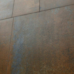 PATINA-CORTEN-METALLIC-FINISH-TILES-WALL. Image shows corten metallic finish tiles to wall in different sizes