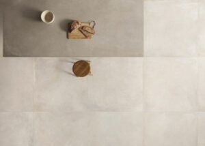 TONE-CHALK-NEW-PORCELAIN-TILES-FLOOR. Image shows chalk colour porcelain tiles on floor of a kitchen.