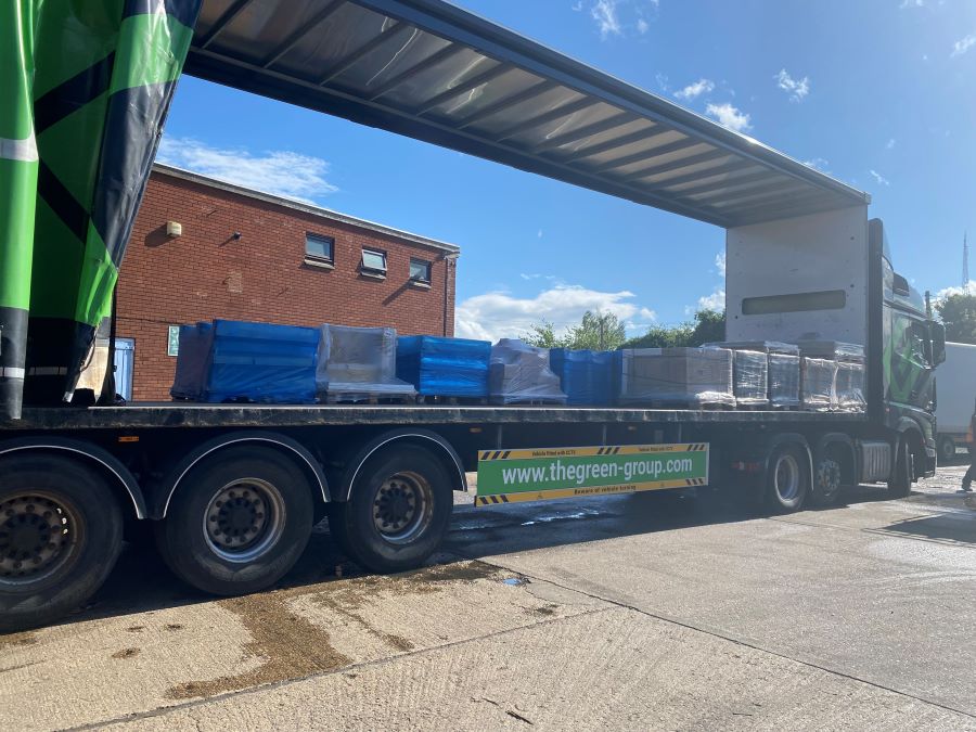 Delivery. Image shows lorry with pallets on it.