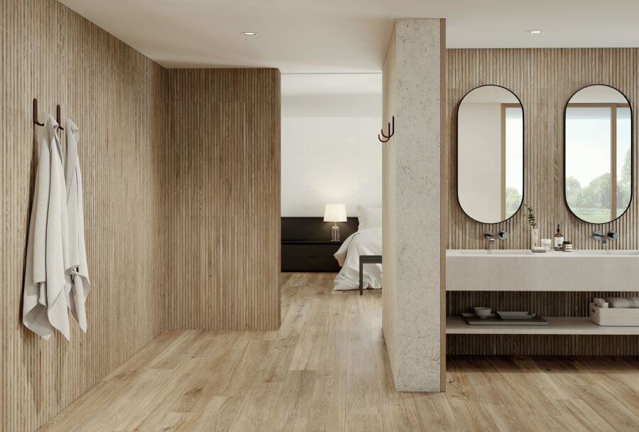 SERENITY-TAUPE-WOOD-PLANK-PORCELAIN-TILE. Image shows taupe wood plank porcelain tiles on bathroom floor with wood slatted tiles to walls