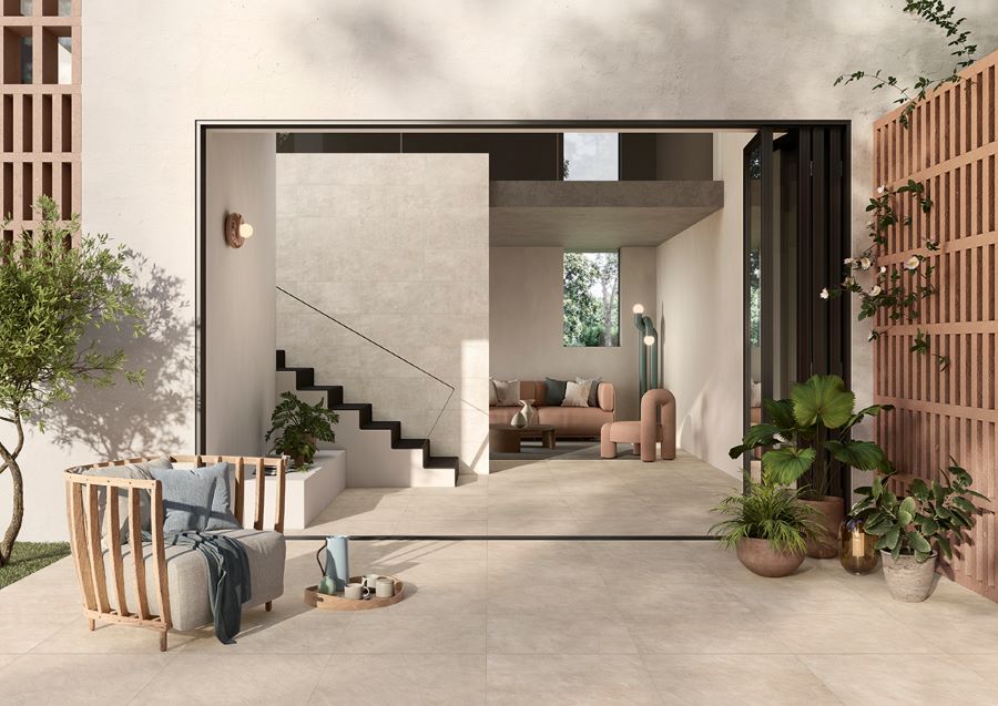 ARE-PORCELAIN-TILES-GOOD-FOR-PATIOS. Image shows beige concrete effect tiles outside and inside