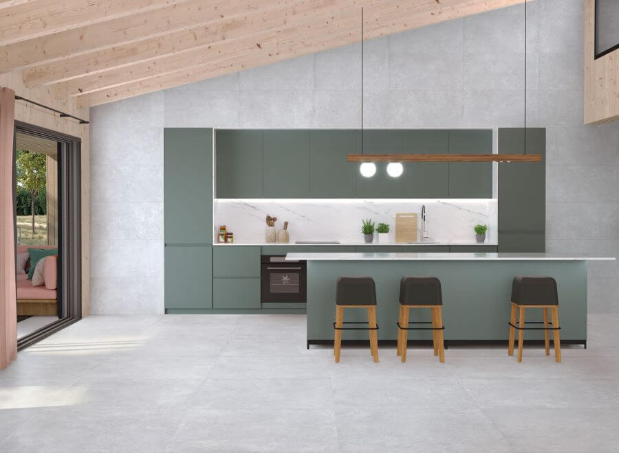 LARGE-WALL-TILES. Image shows light grey tiles in kitchen with sage green kitchen units